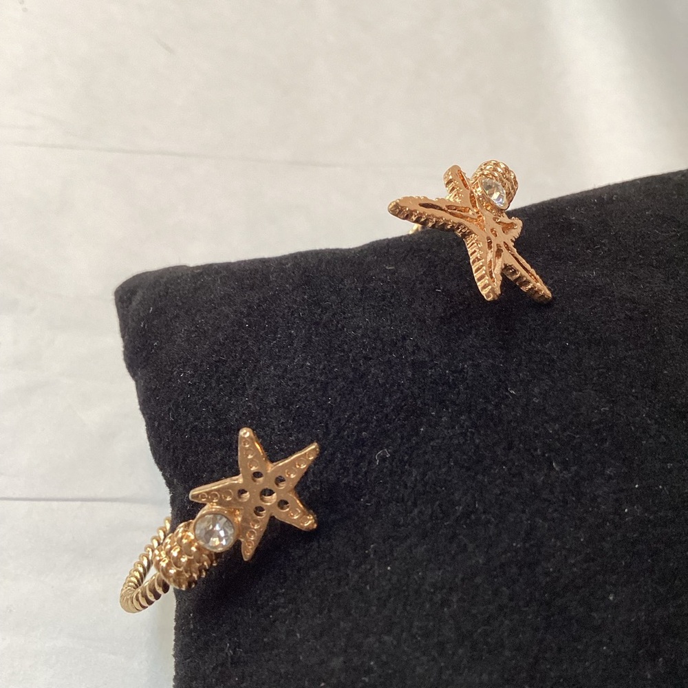 Starfish accented by rhinestones on an open cuff, flexible bracelet, gold tone - Picture 3 of 10